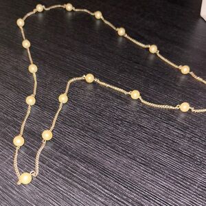 Chic Gold Necklace with Pearl Accents Free hoop earrings w/ purchase